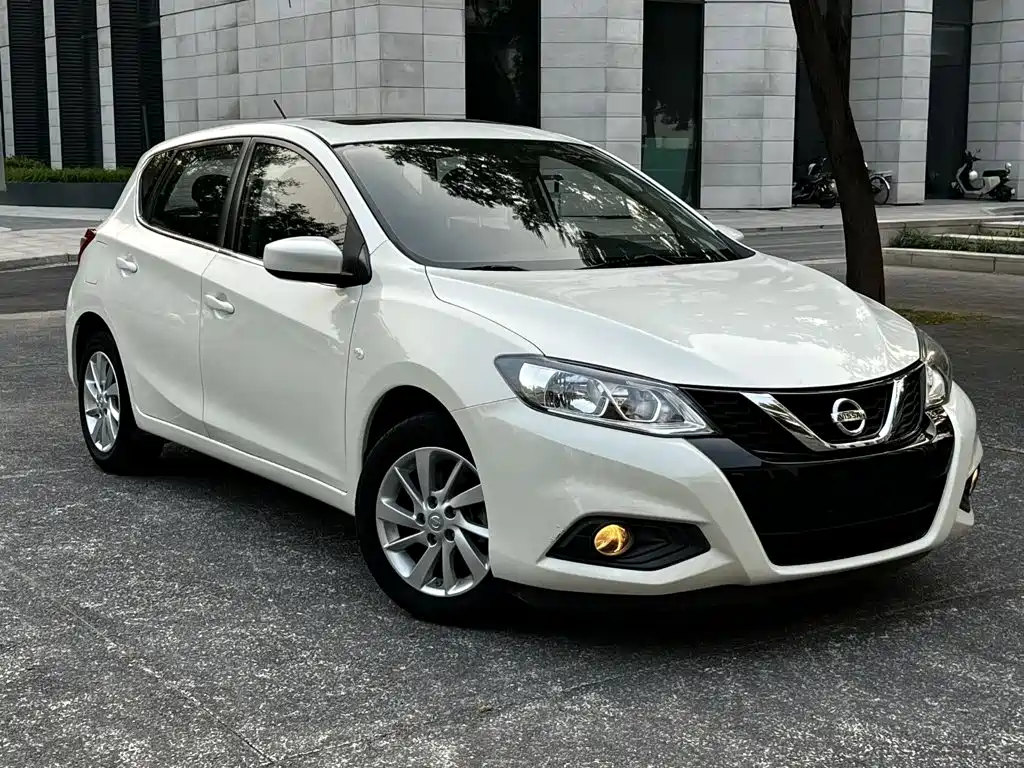 Nissan Tiida — фото 14