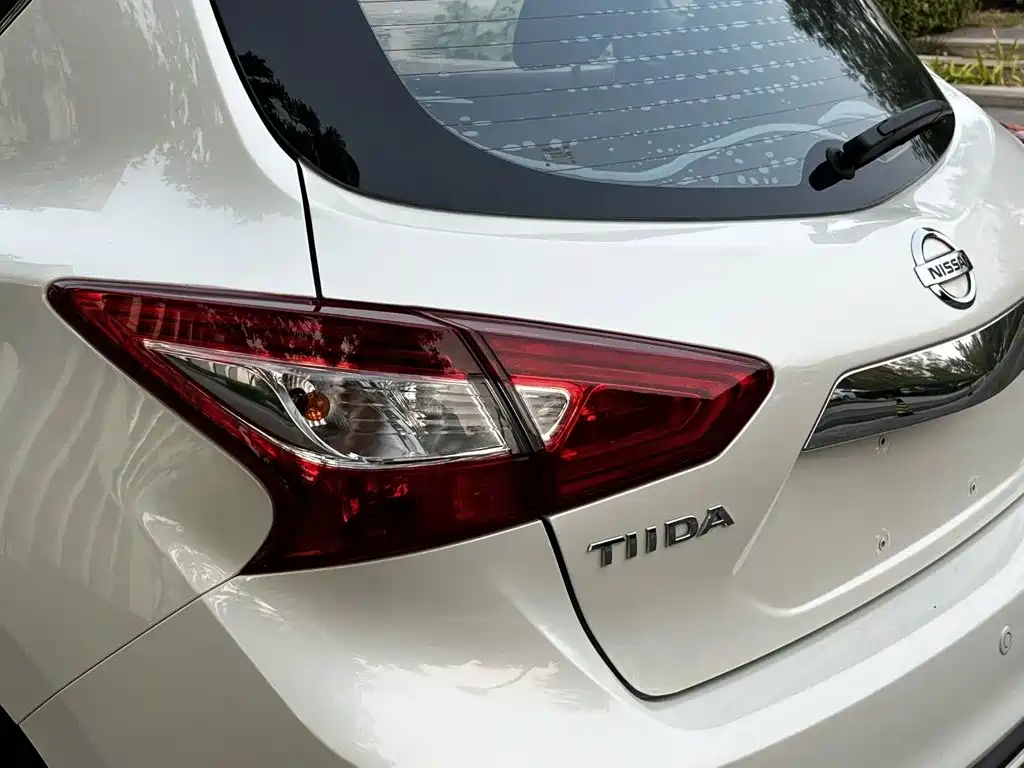 Nissan Tiida — фото 15