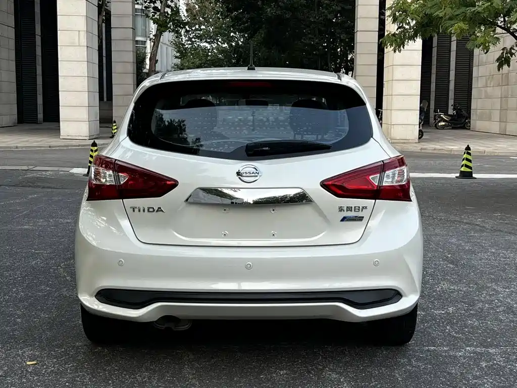 Nissan Tiida — фото 19