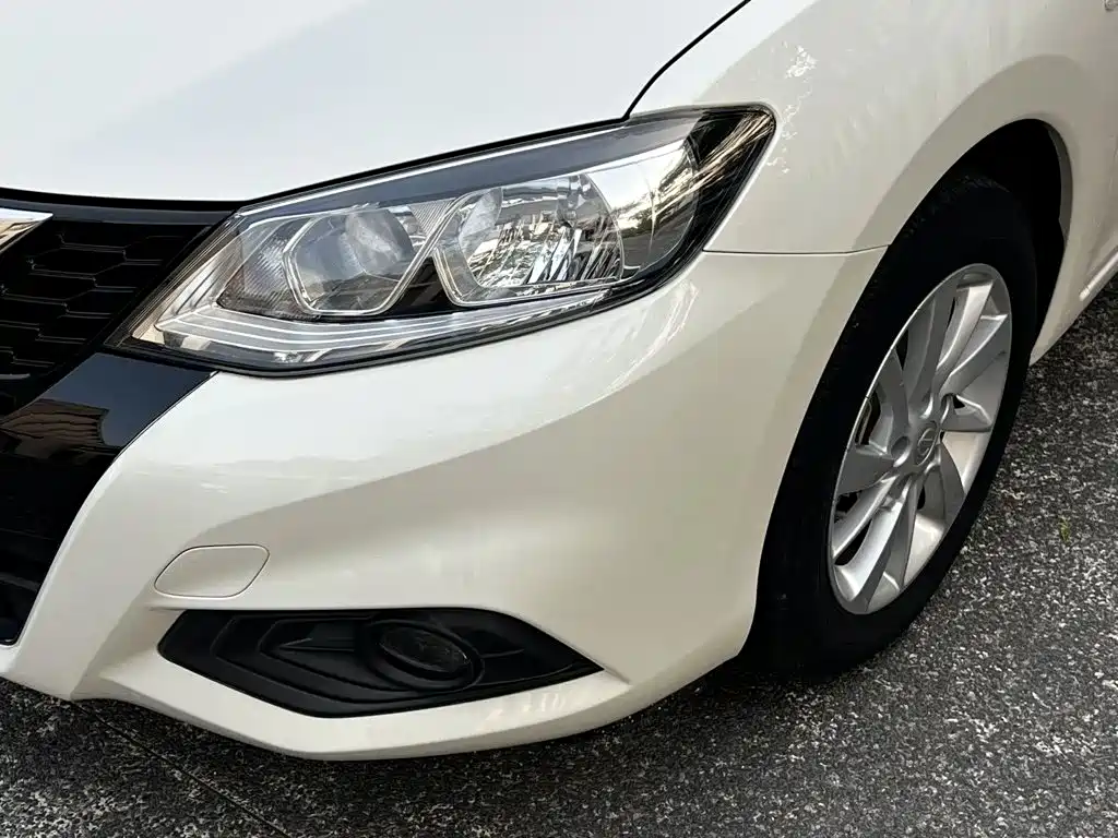 Nissan Tiida — фото 4