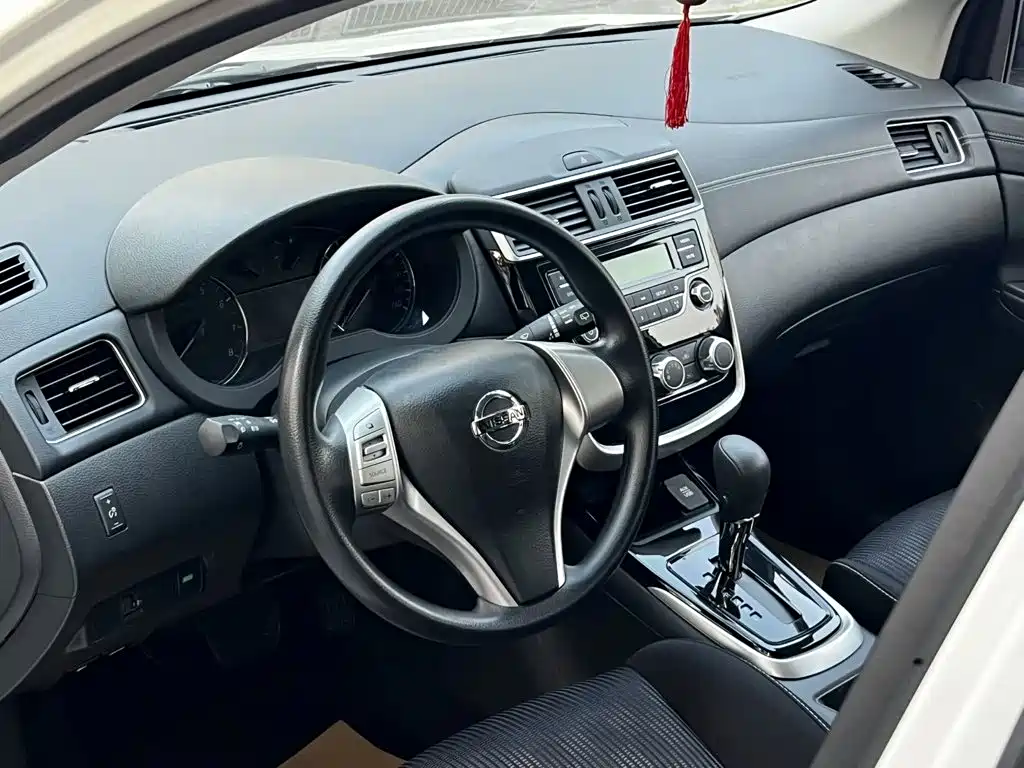 Nissan Tiida — фото 8
