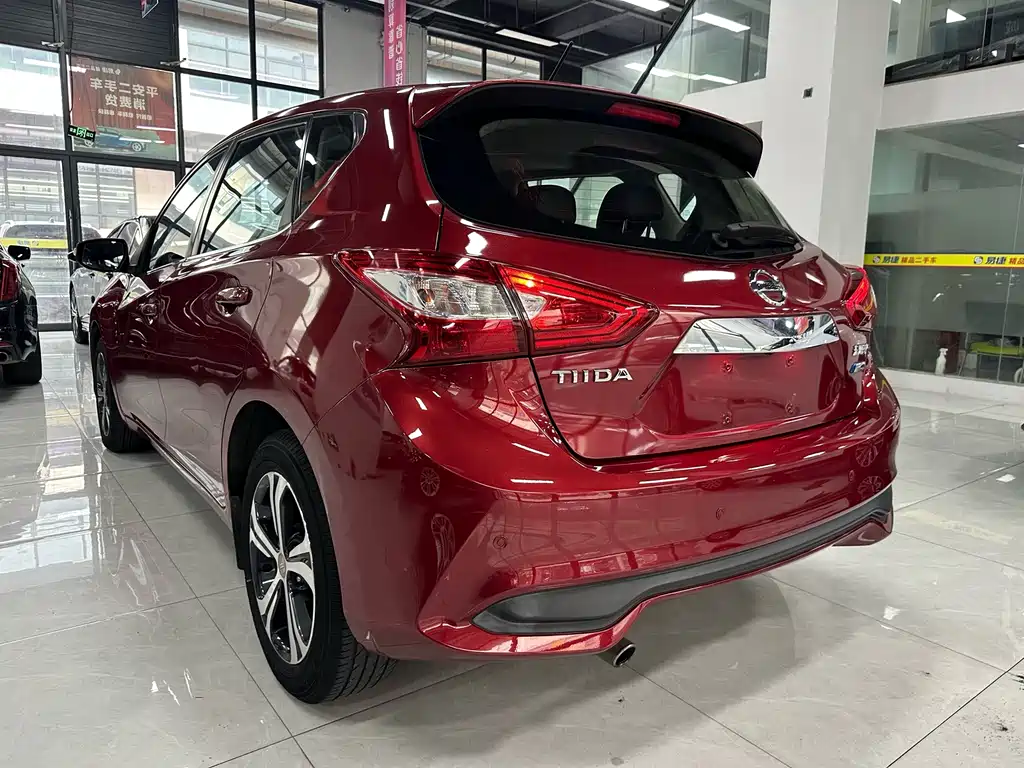 Nissan Tiida — фото 10