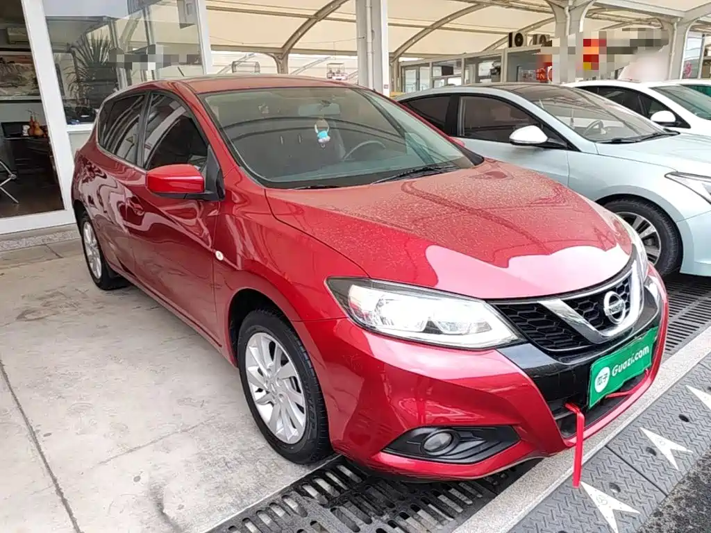 Nissan Tiida — фото 4