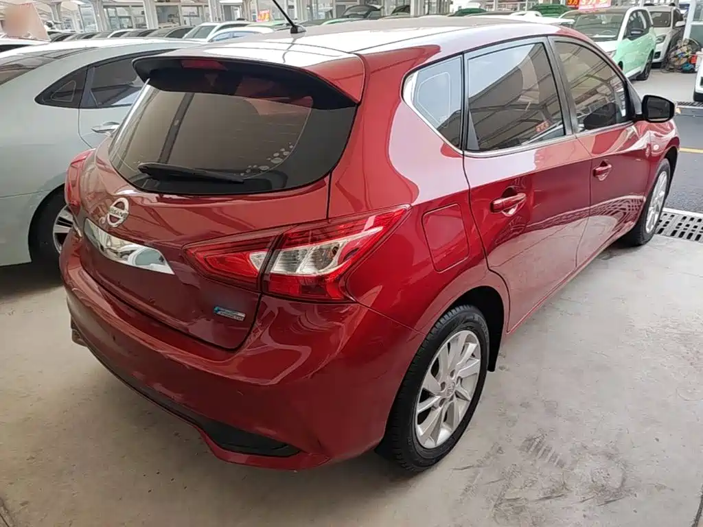 Nissan Tiida — фото 7