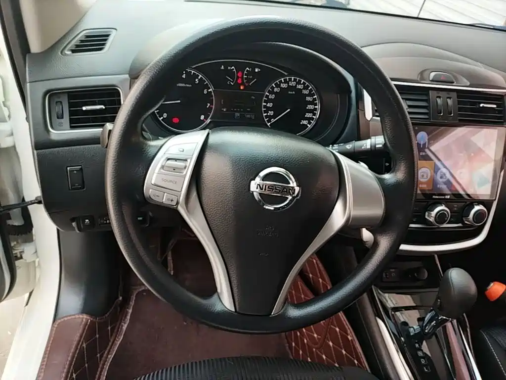 Nissan Tiida — фото 11
