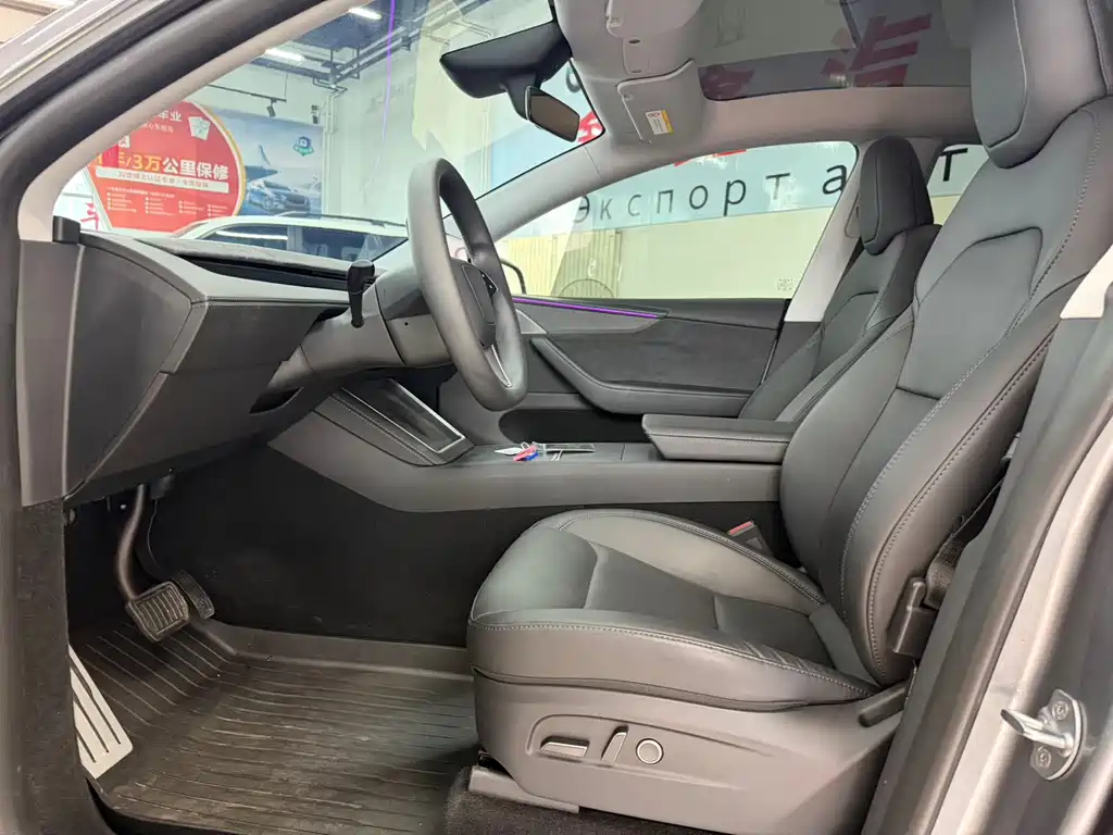 Tesla Model Y — фото 13