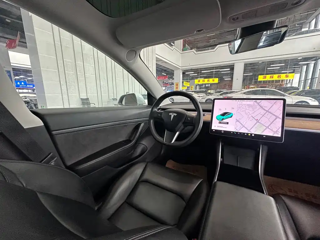Tesla Model 3 — фото 14