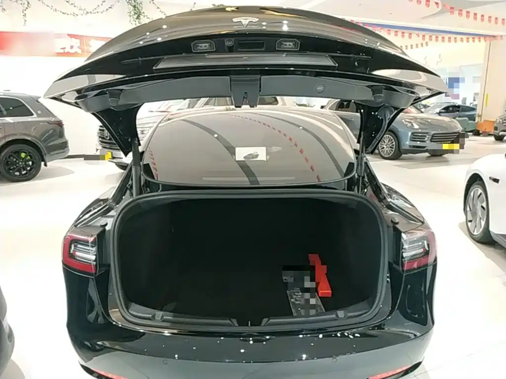 Tesla Model 3 — фото 19