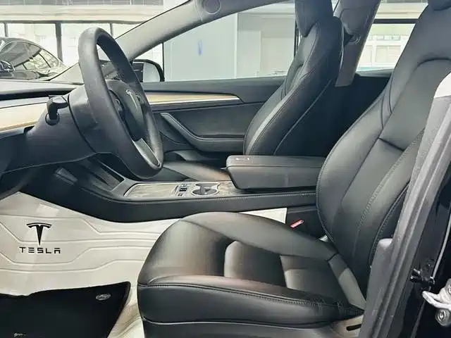 Tesla Model 3 — фото 7