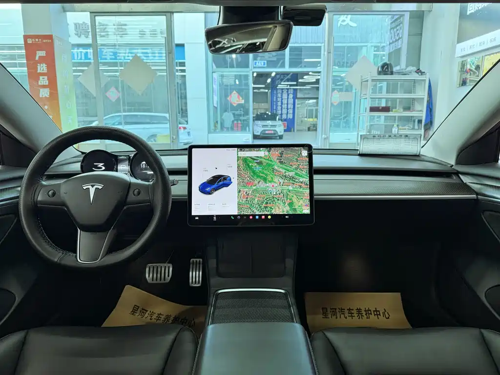 Tesla Model 3 — фото 11