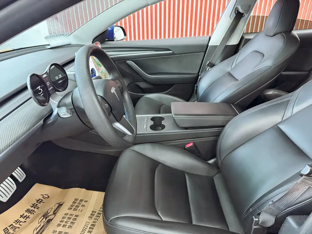 Tesla Model 3 — фото 14