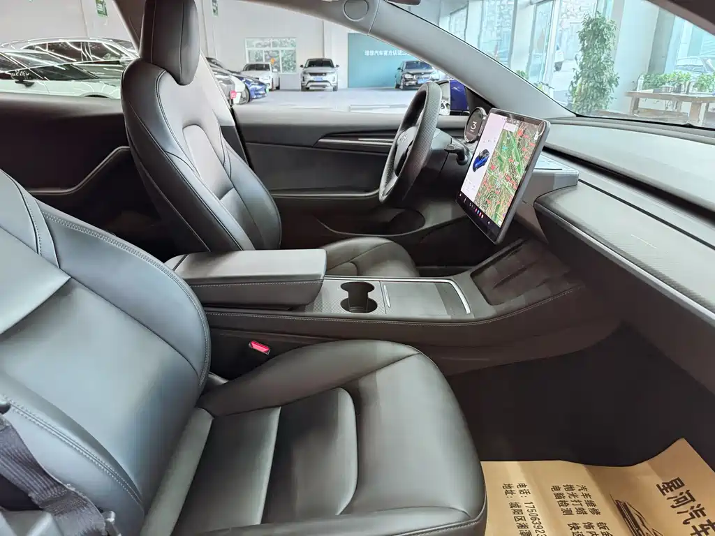 Tesla Model 3 — фото 17
