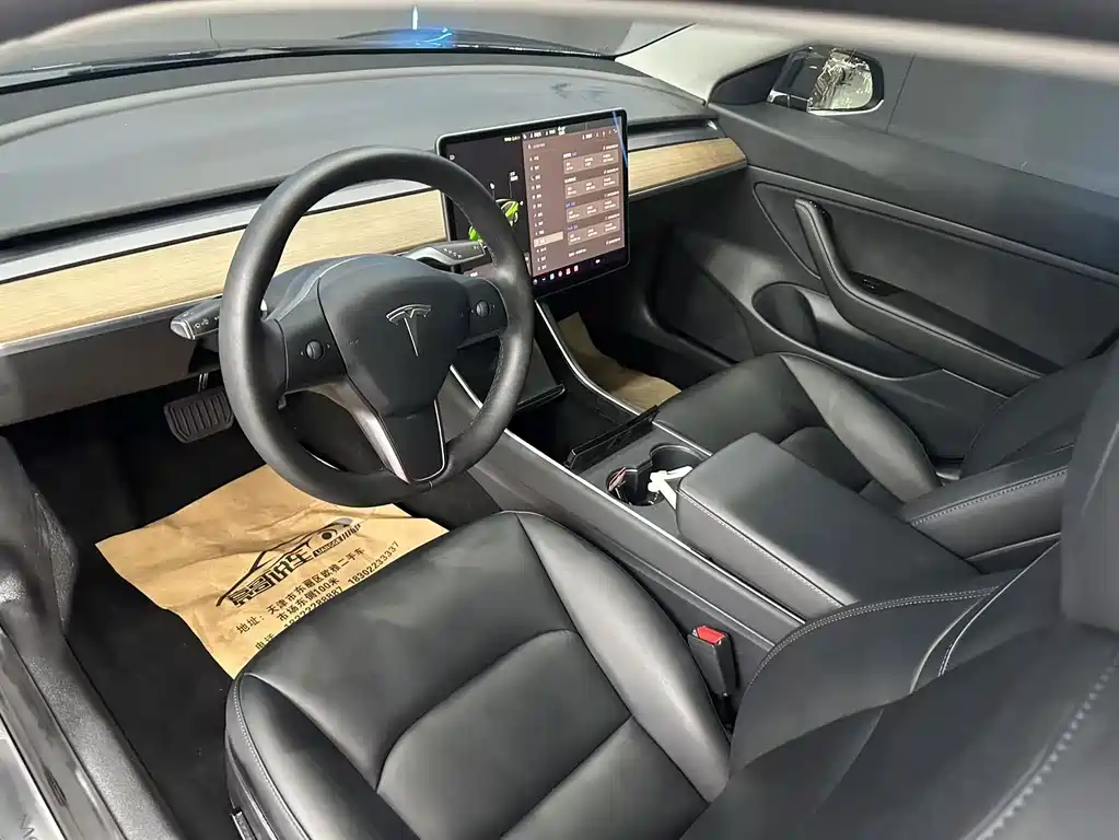 Tesla Model 3 — фото 11