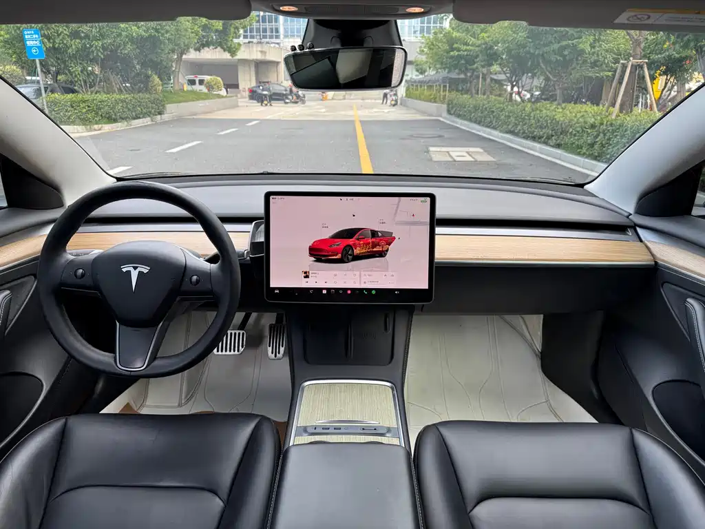 Tesla Model 3 — фото 17