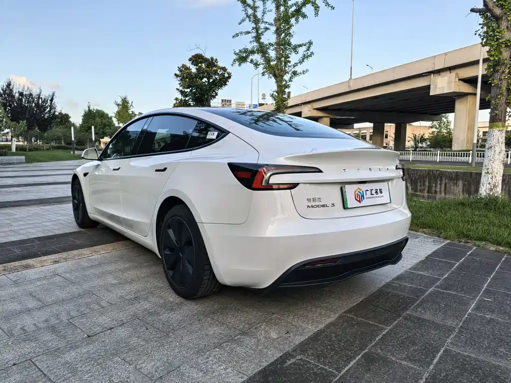 Tesla Model 3 — фото 11