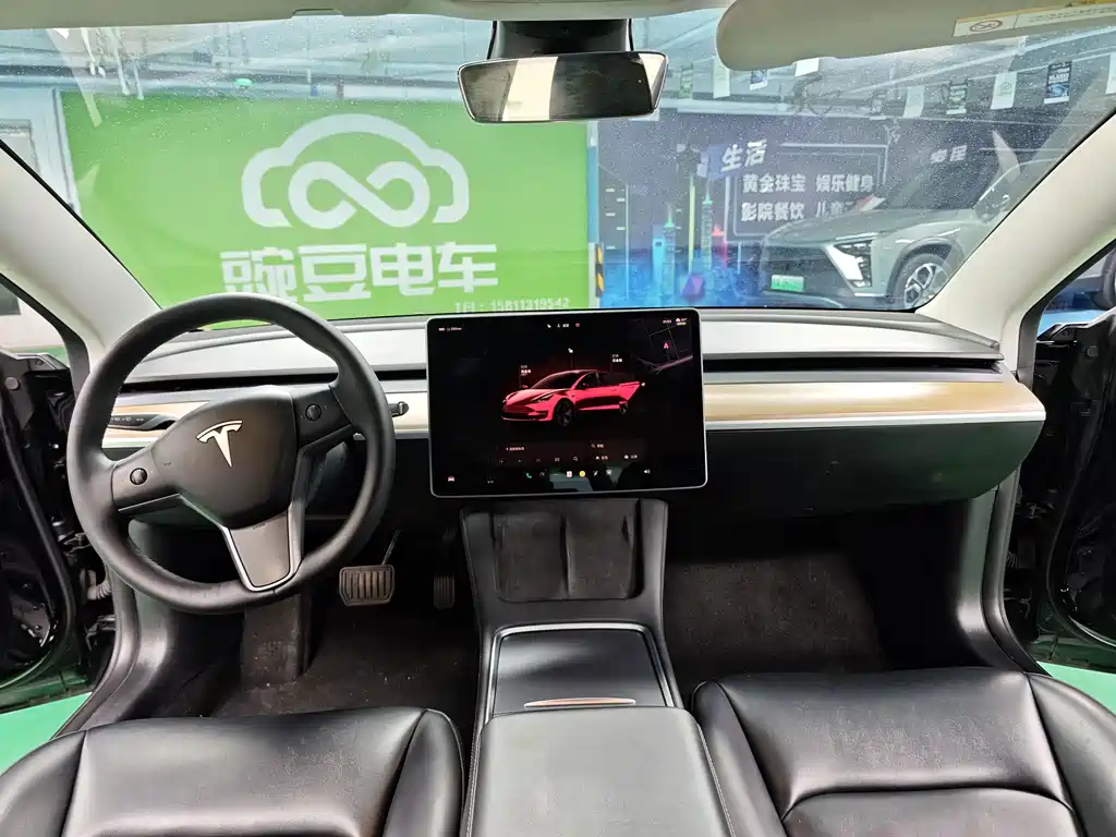 Tesla Model 3 — фото 11
