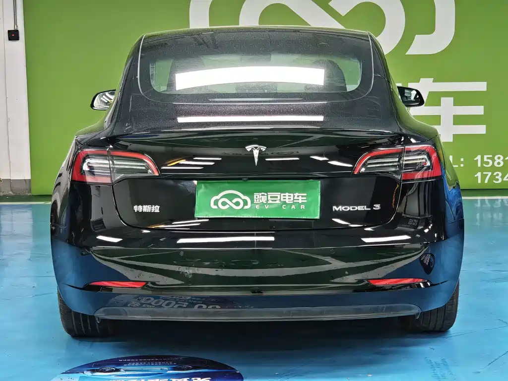 Tesla Model 3 — фото 18