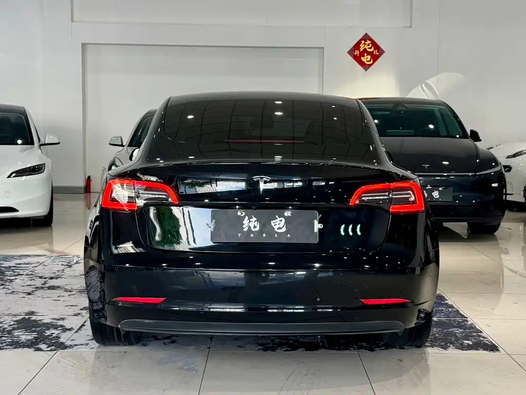 Tesla Model 3 — фото 11