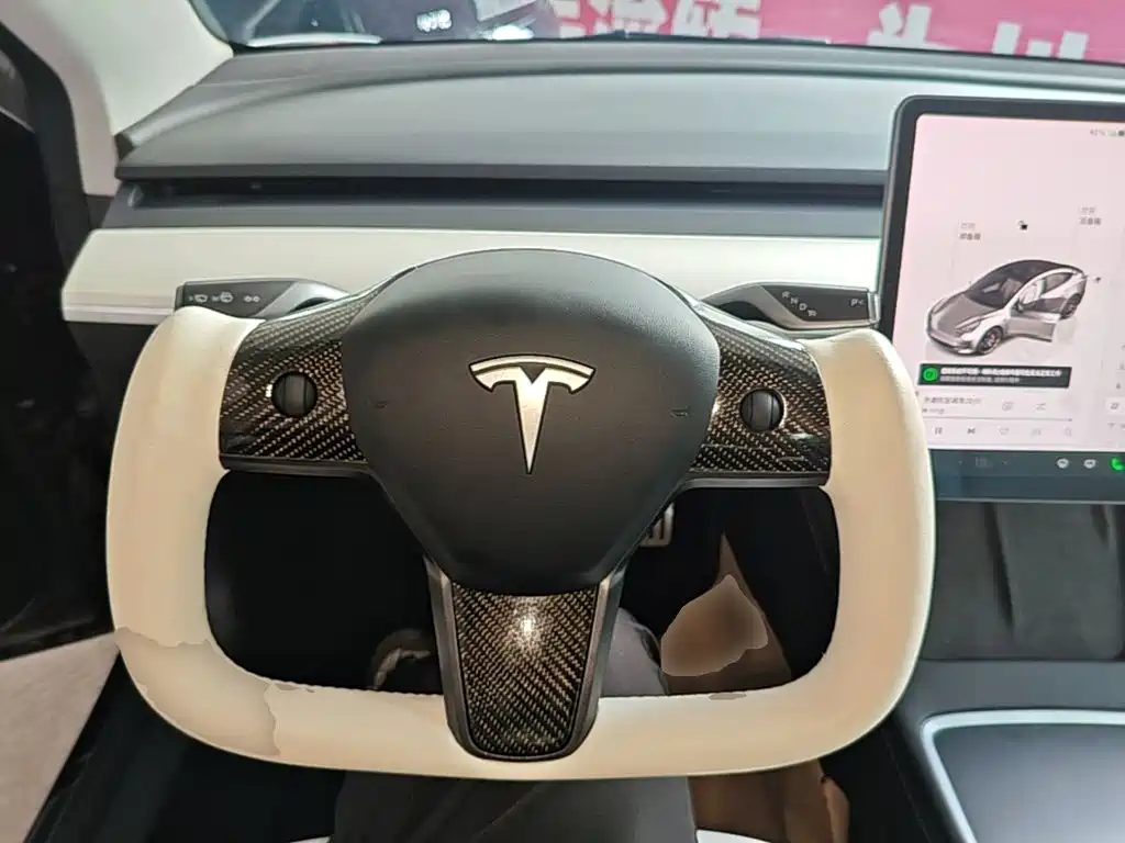 Tesla Model 3 — фото 11