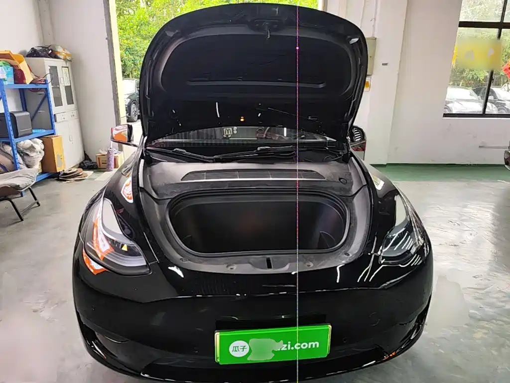 Tesla Model Y — фото 20