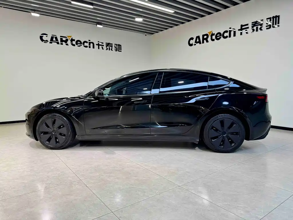 Tesla Model 3 — фото 7
