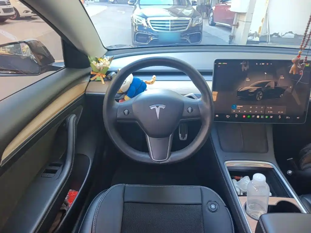 Tesla Model 3 — фото 11