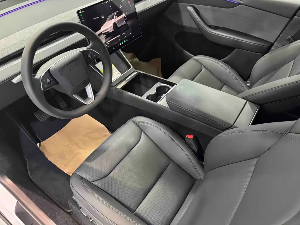 Tesla Model Y — фото 15
