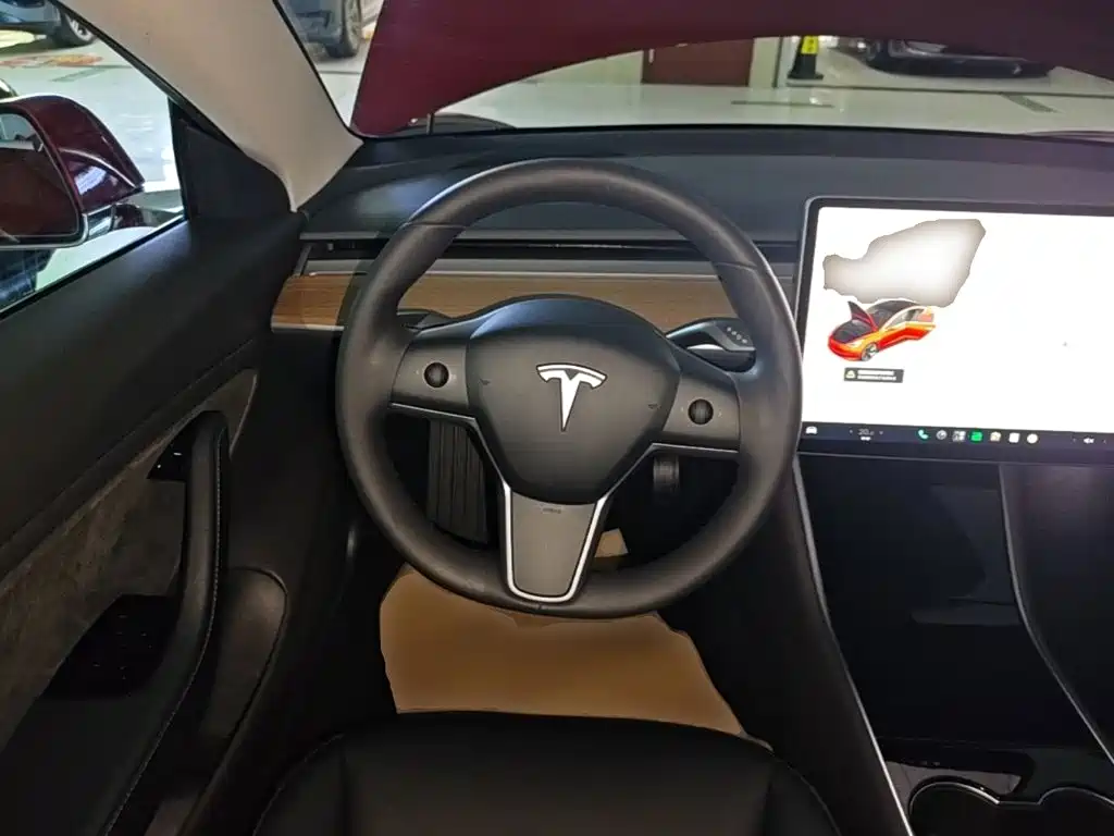 Tesla Model 3 — фото 11