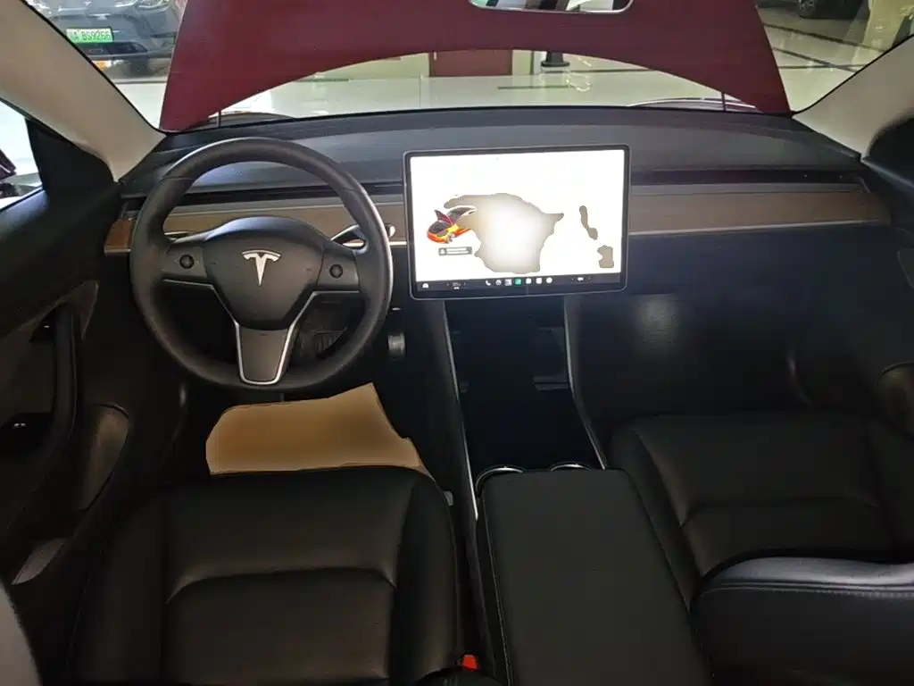 Tesla Model 3 — фото 10