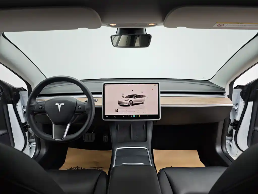 Tesla Model 3 — фото 17