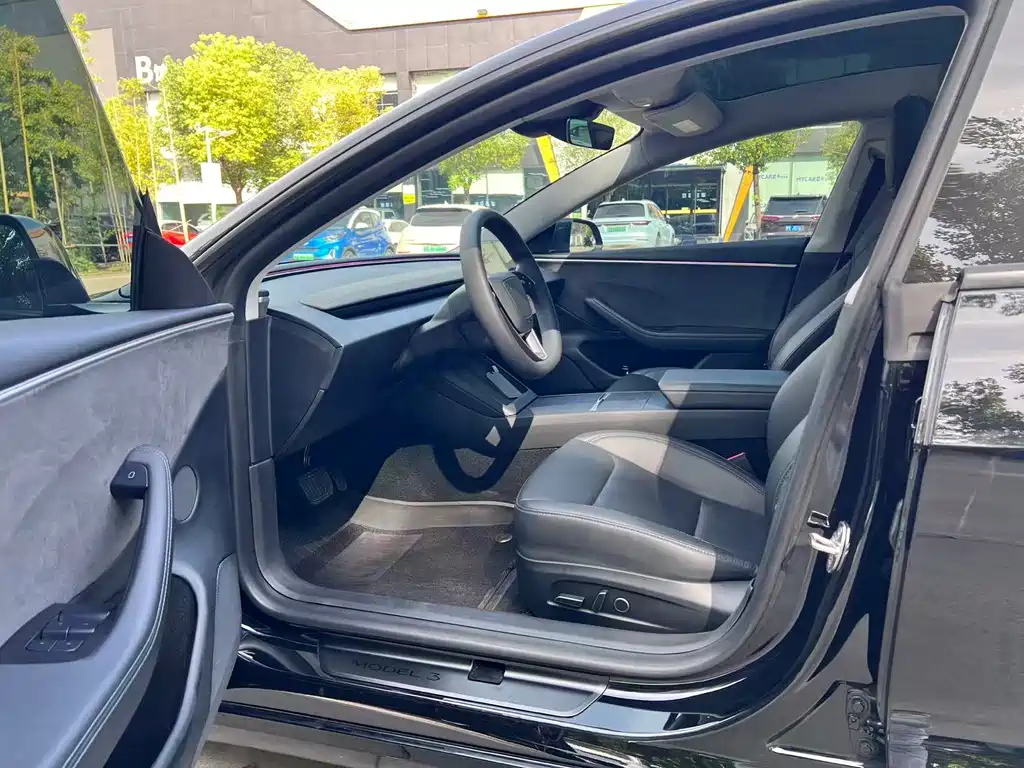 Tesla Model 3 — фото 13