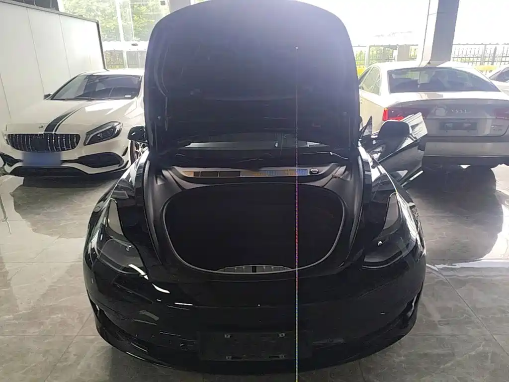 Tesla Model 3 — фото 16