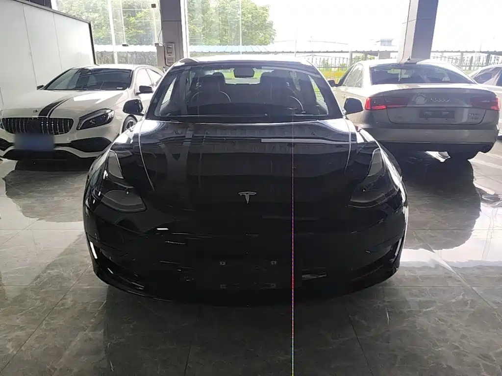 Tesla Model 3 — фото 3