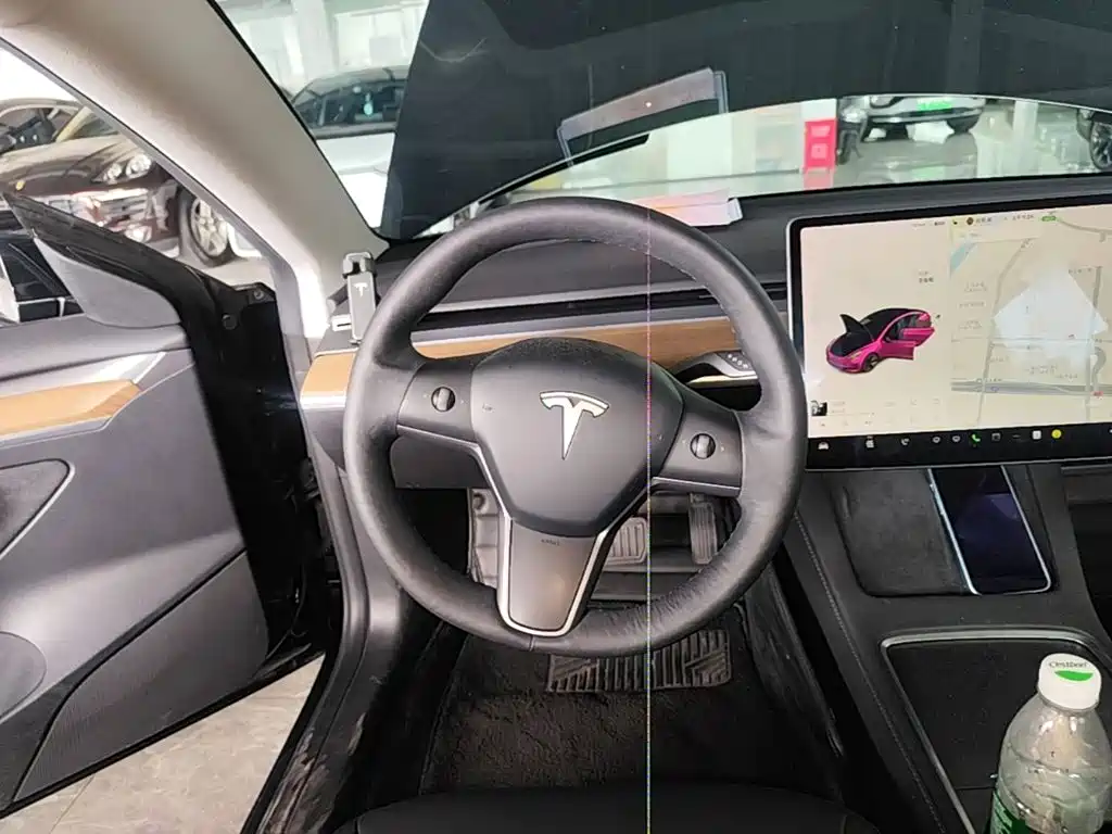 Tesla Model 3 — фото 7