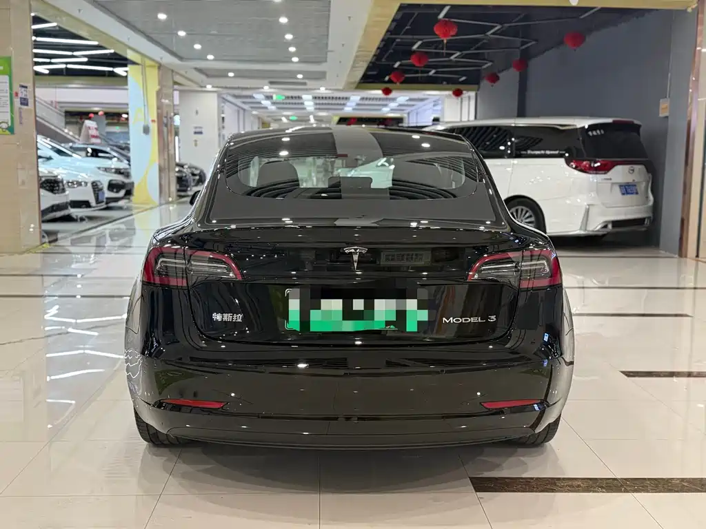 Tesla Model 3 — фото 8