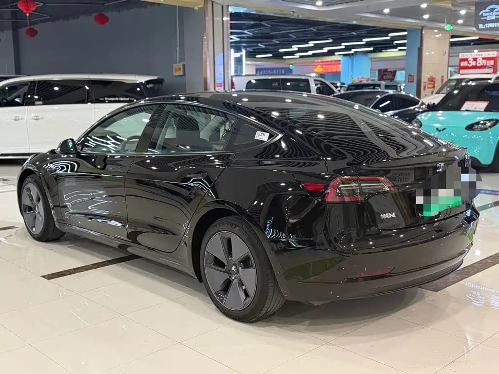Tesla Model 3 — фото 9