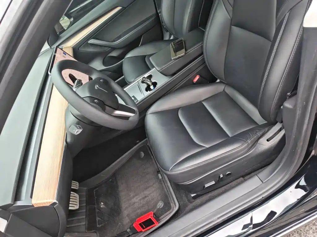 Tesla Model 3 — фото 11