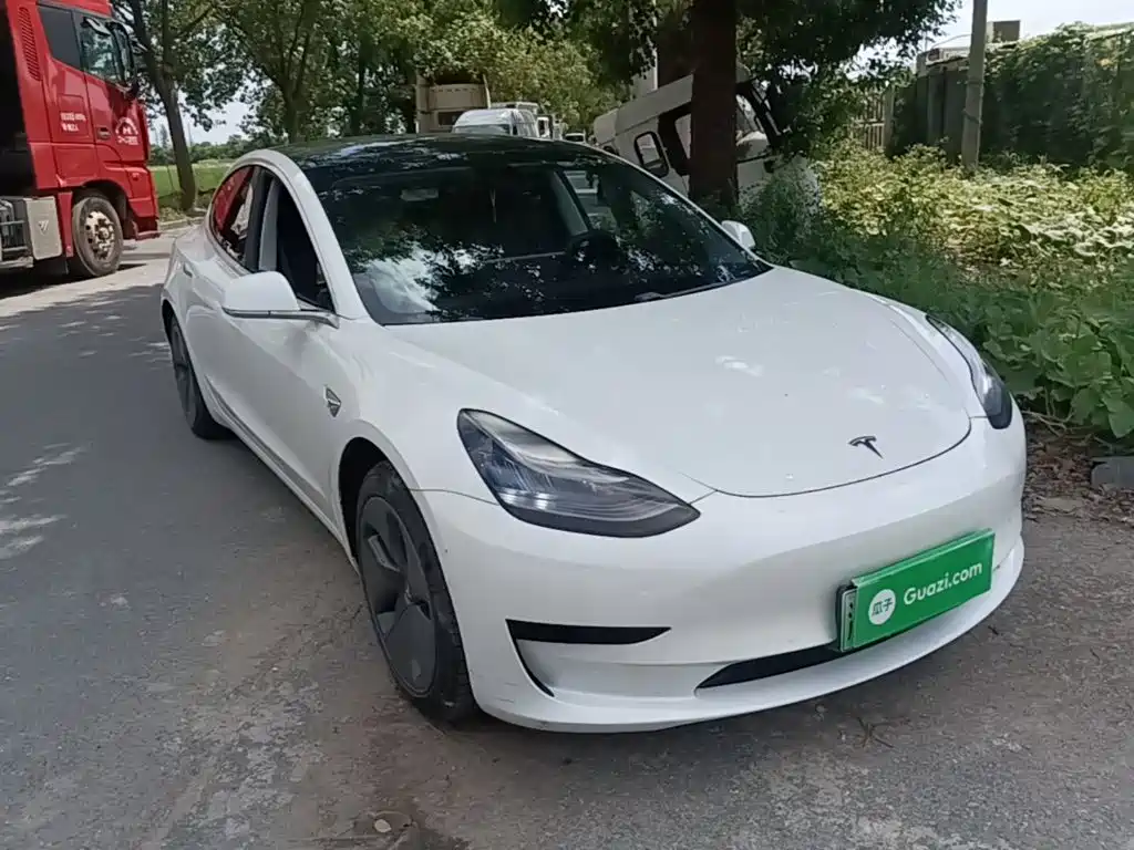 Tesla Model 3 — фото 24