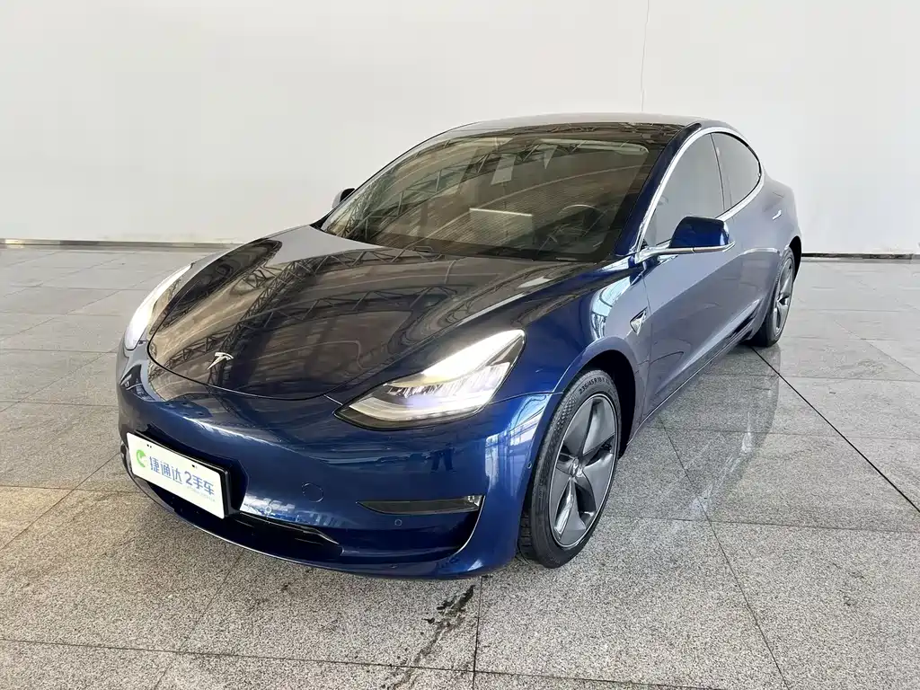 Tesla Model 3 — фото 11