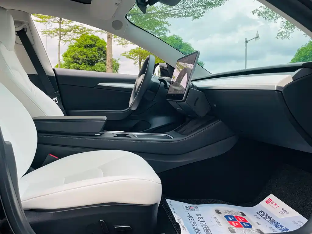 Tesla Model 3 — фото 19