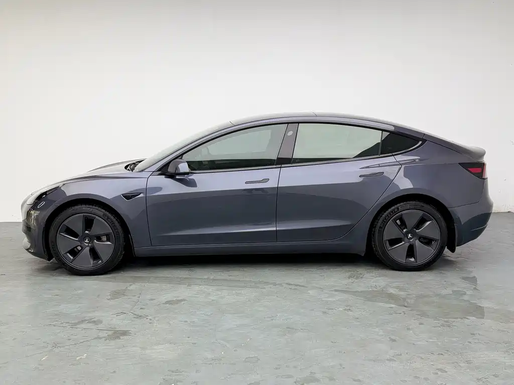 Tesla Model 3 — фото 17