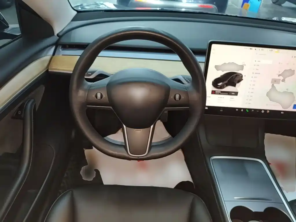Tesla Model 3 — фото 11