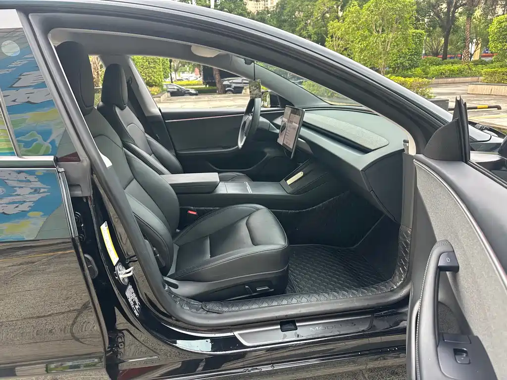Tesla Model 3 — фото 11
