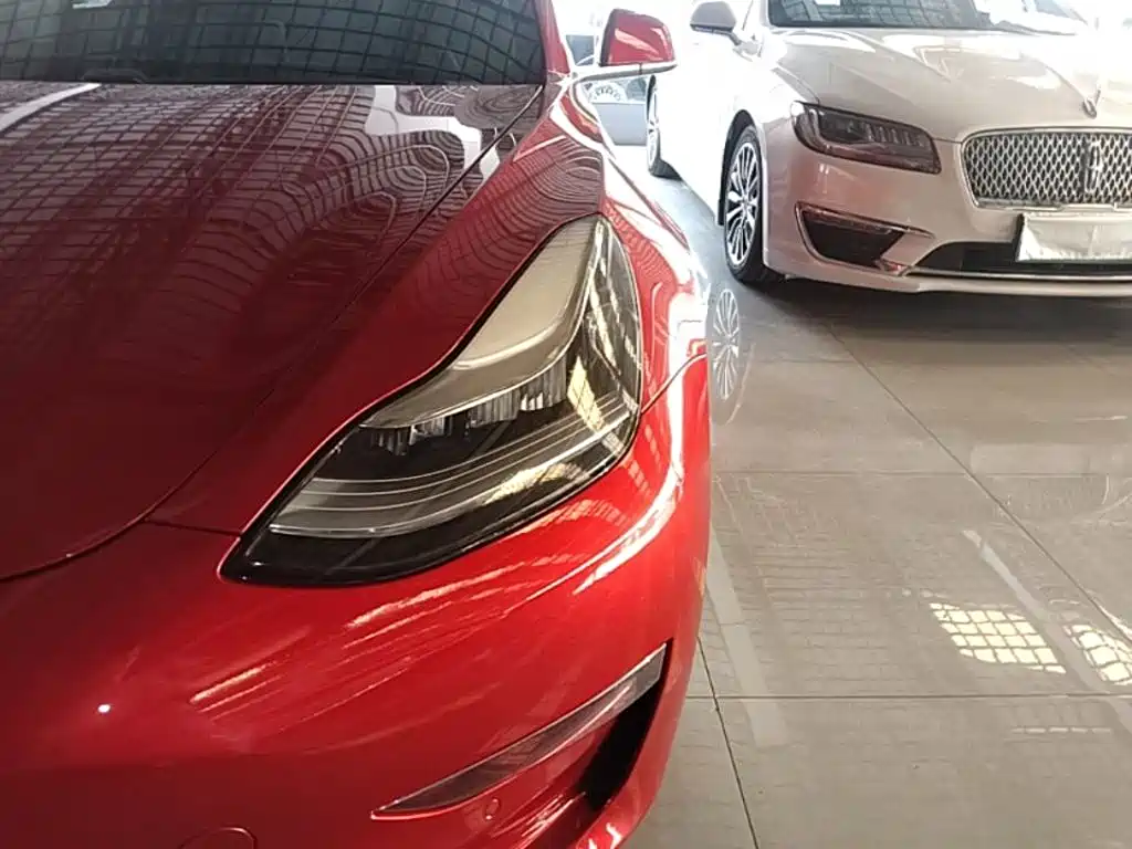 Tesla Model 3 — фото 24