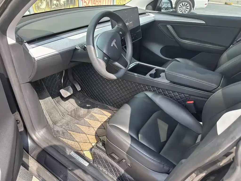 Tesla Model Y — фото 7