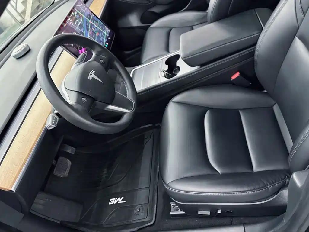 Tesla Model 3 — фото 13