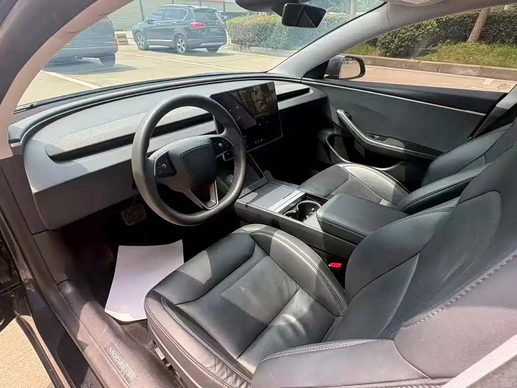 Tesla Model 3 — фото 7