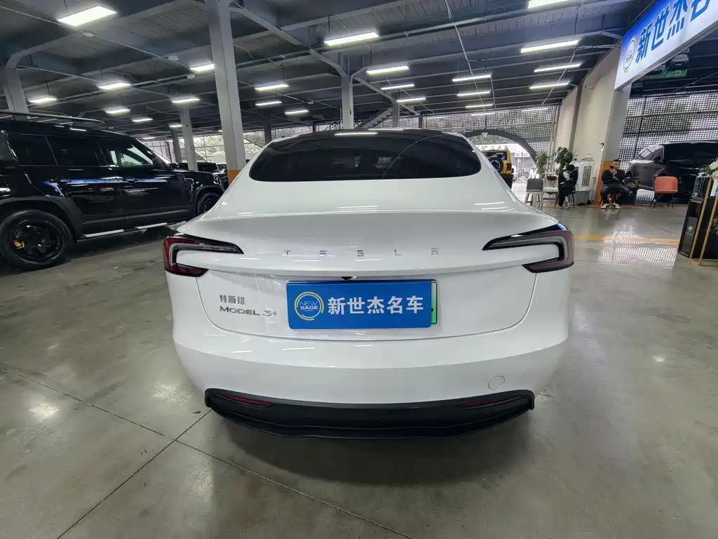 Tesla Model 3 — фото 11
