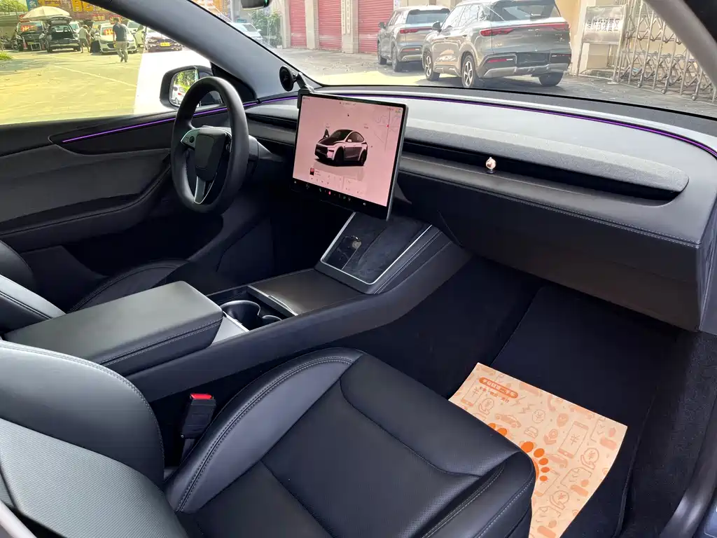 Tesla Model Y — фото 13