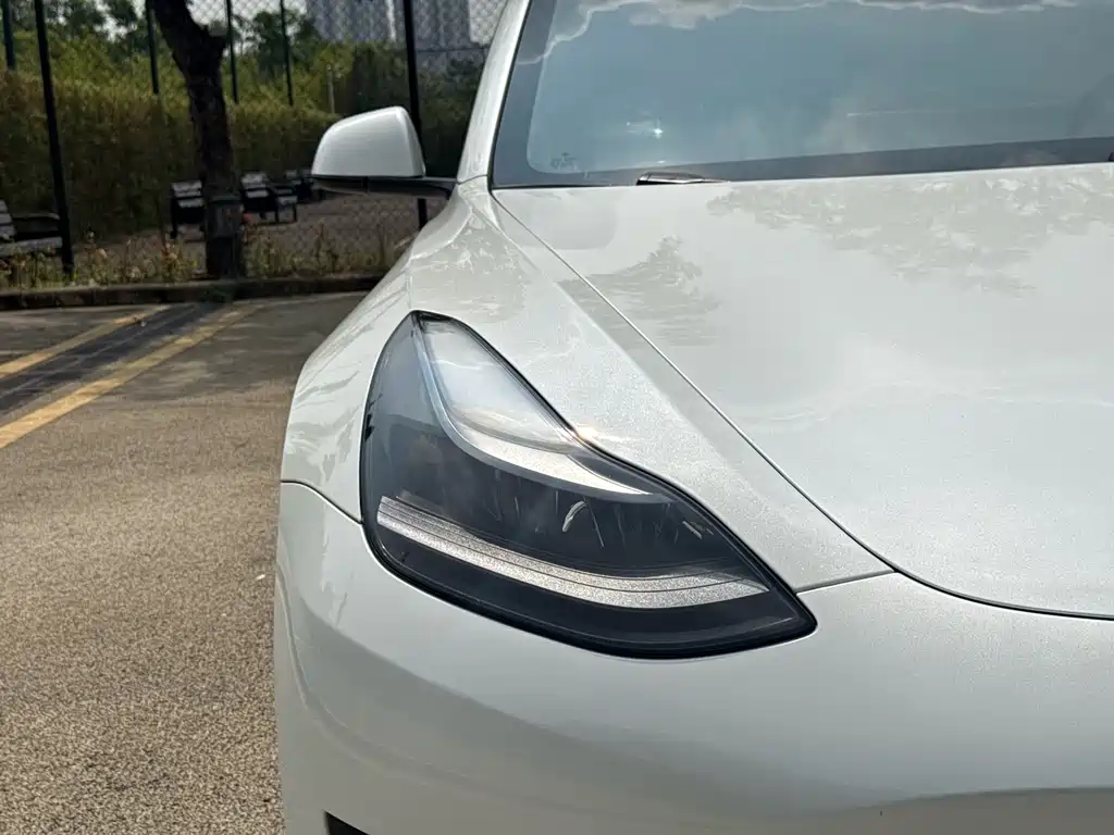 Tesla Model 3 — фото 14